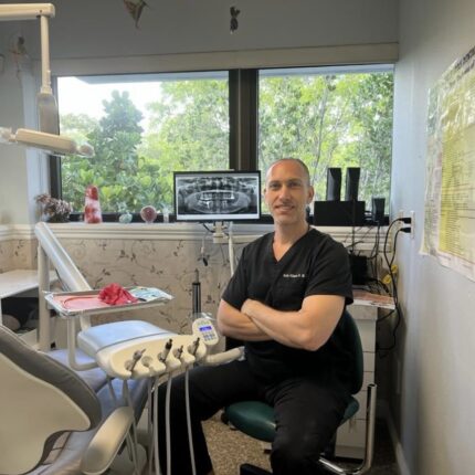 Dr. Seth Gilson, DMD - Mindful Doctor at the office with xrays