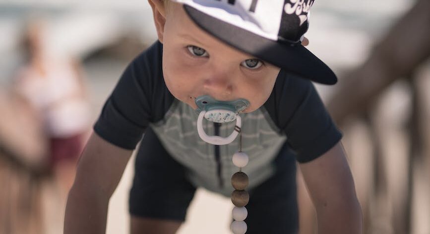 a boy wearing a cap